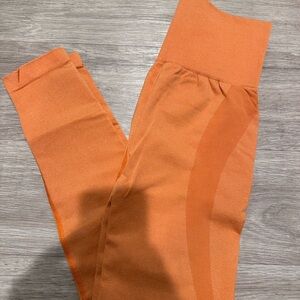 NVGTN Orange High-Waisted Leggings